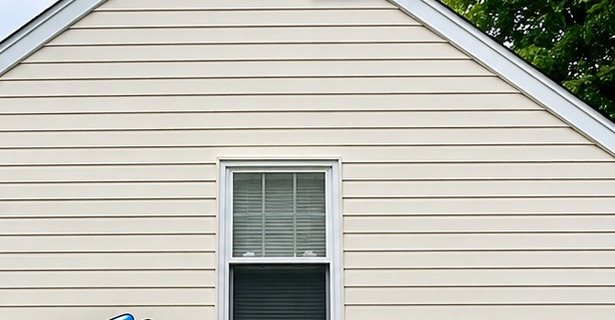 Same vinyl siding bright and clean after Elite Pressure Pros soft washing